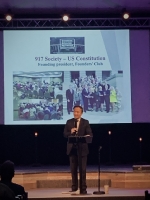 Dr. Wang, president of the Founders Club of the 917 Society, presented about 917