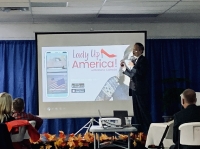 Dr. Wang, president of the Founders Club of Lady Up America, presented about LUA