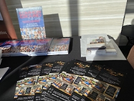 Dr. Wang, president of the Founders Club of the American Bible Project, displayed info about ABP