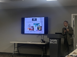 Dr. Wang explaining the invention of the AMCL