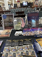 Dr. Wang, president of the Founders Club of the American Bible Project, displayed info about ABP