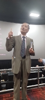 Dr. Wang providing his testimony