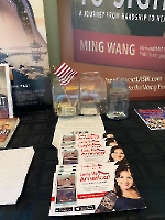 Dr. Wang, president of the Founders Club of Lady Up America, displayed info about LUA