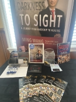 Dr. Wang, president of the Founders Club of the American Bible Project, displayed info about ABP